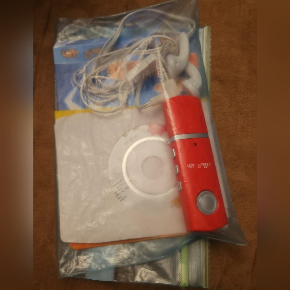 Hip Street Digital MP3 Player-512mb-takes 1 AAA battery-earphones included